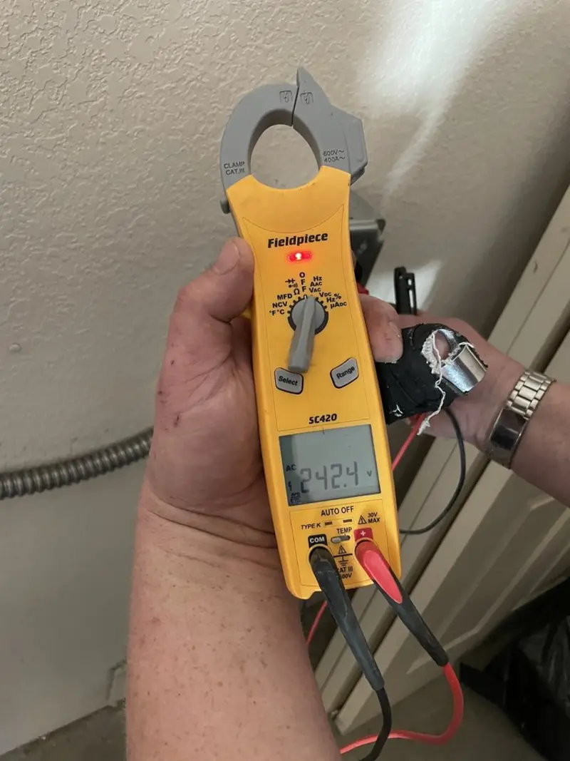 Voltage testing with clamp meter during Circuit Breaker Repair in Wylie